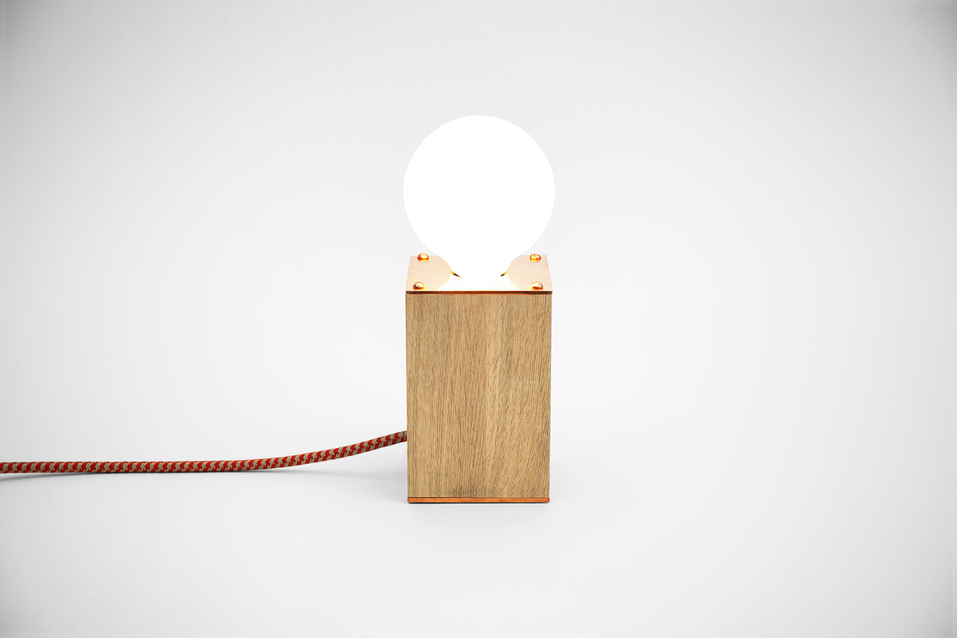 Simple bedside lamp in oak wood and fashionable copper with functional touch dimmer inspired by scandinavian design