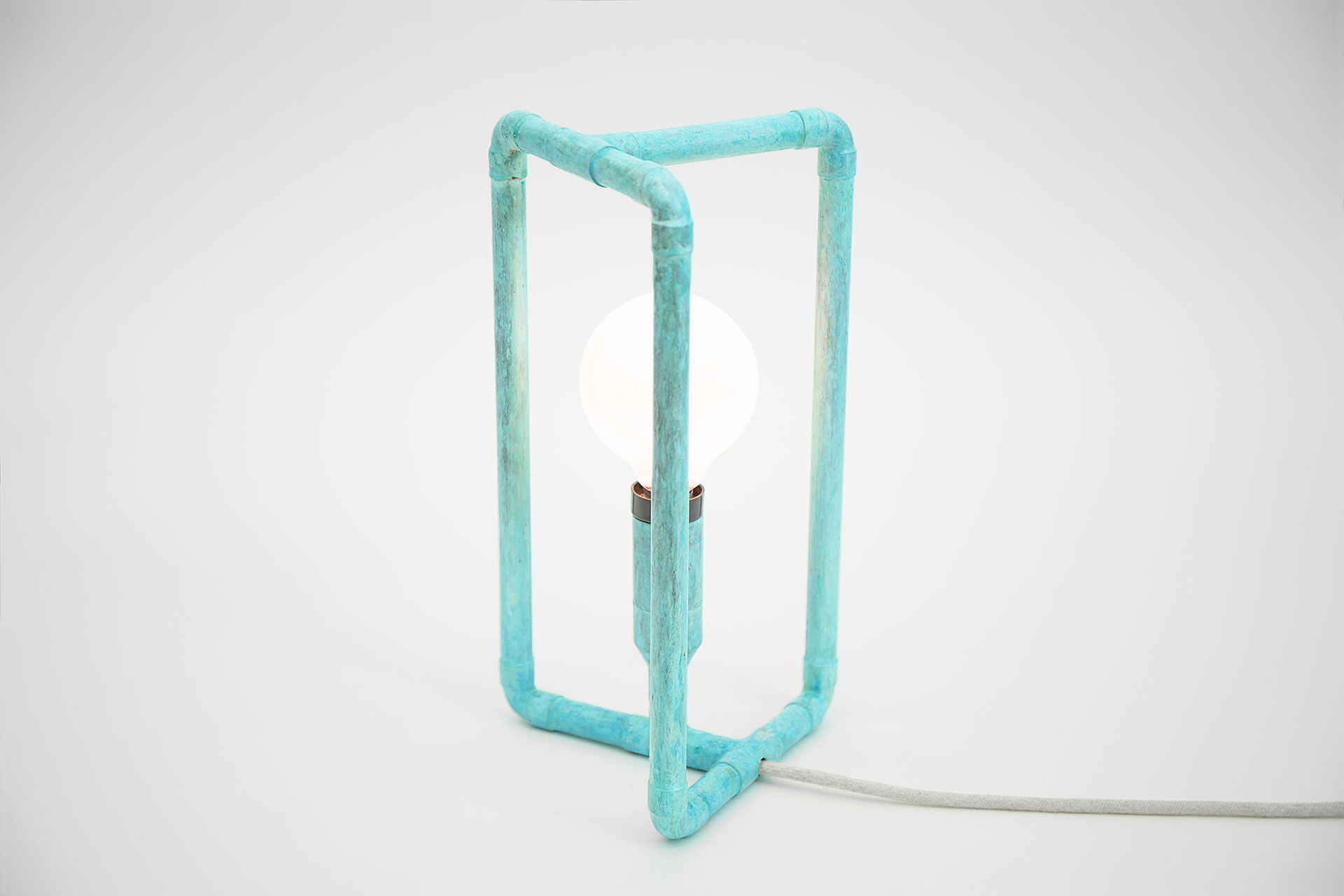 Cozy bedside lamp in trendy turquoise patina with creative touch dimmer inspired by scandinavian design