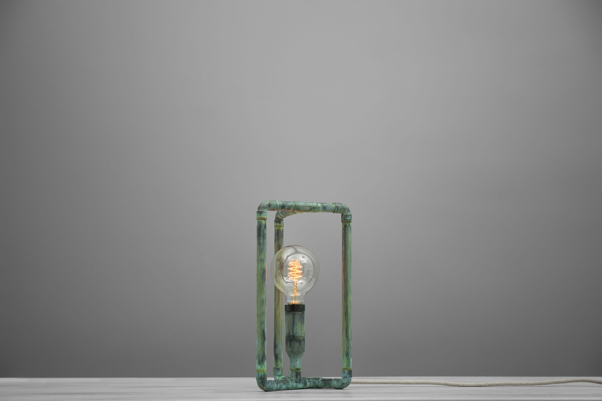 Loft style desk lamp in natural green patina with creative touch dimmer and vintage Edison bulb