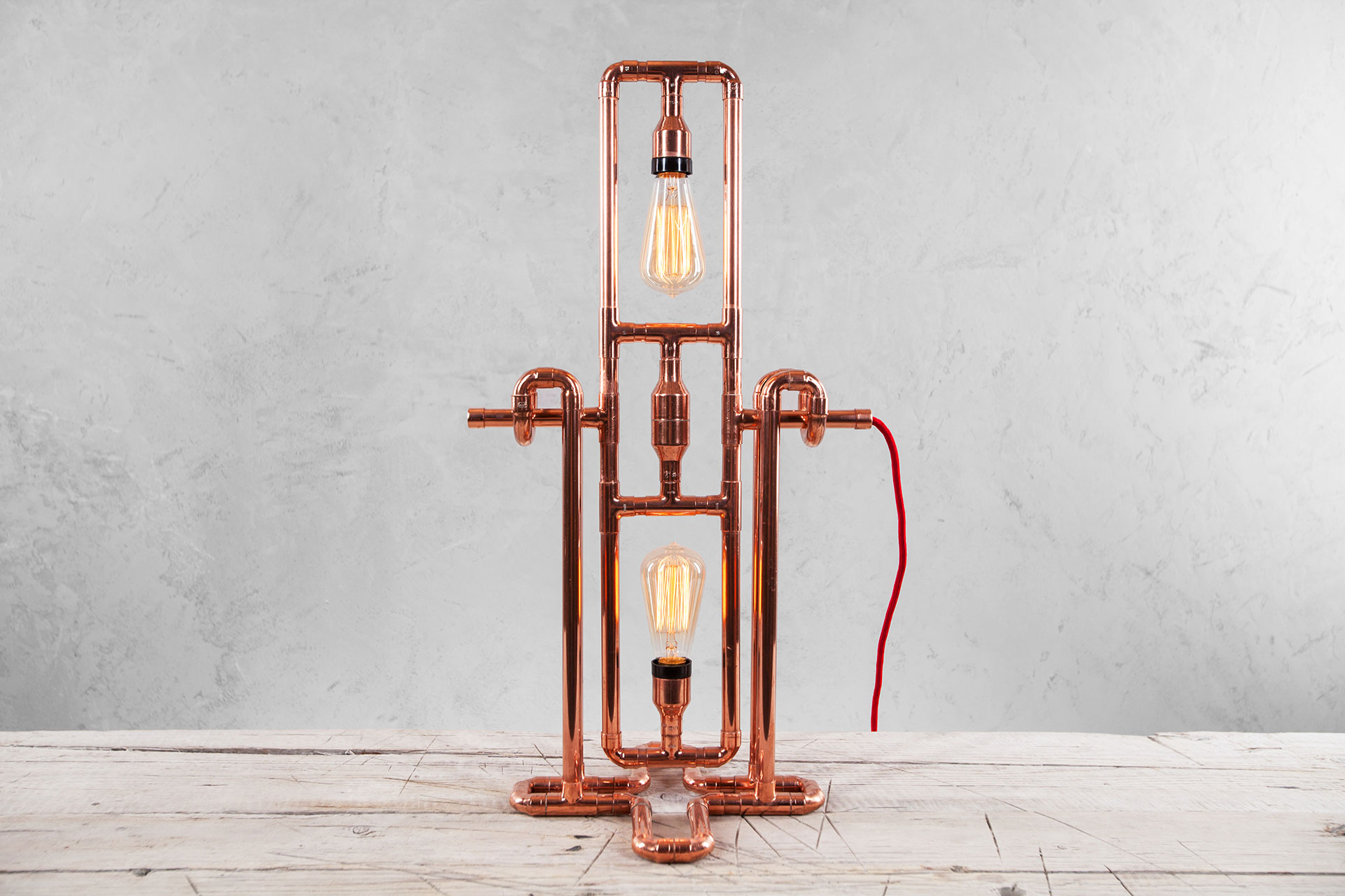 Unique rotating table lamp in trendy copper or gold brass inspired by steampunk design