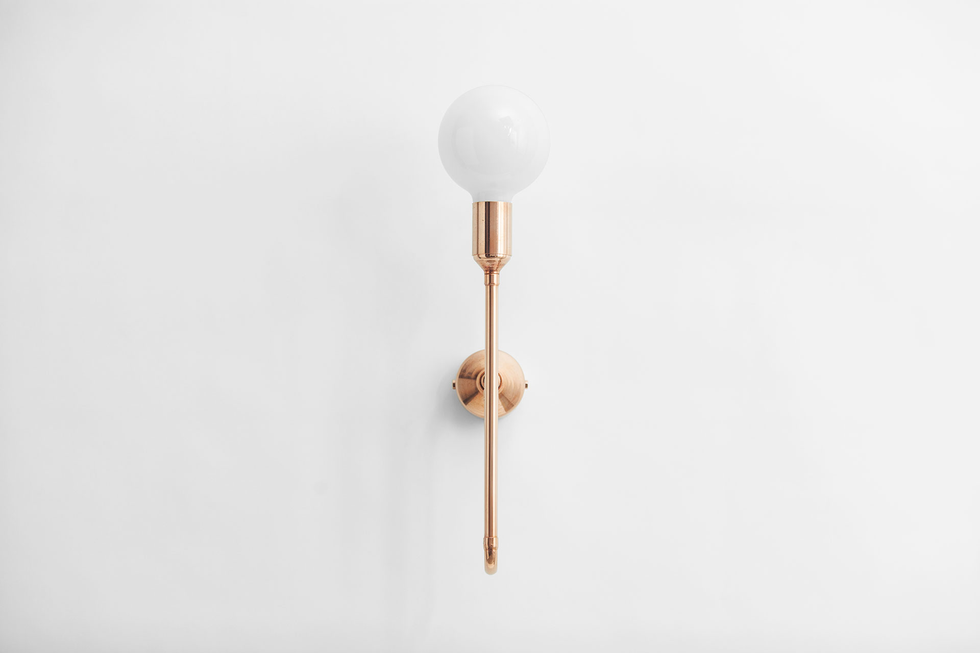 Modern minimalist sconce in copper or brass