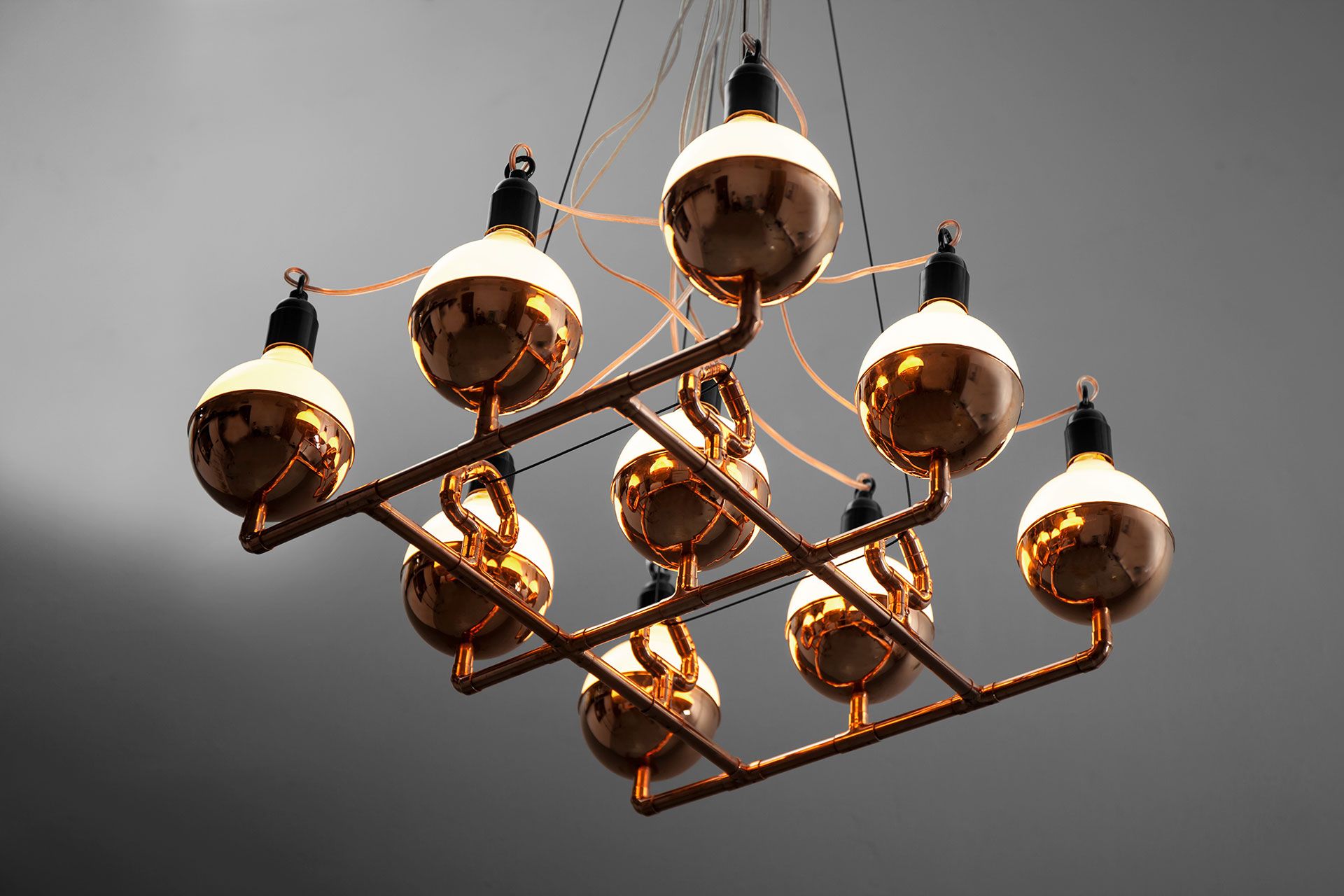 Industrial design copper ceiling lamp in loft style restaurant