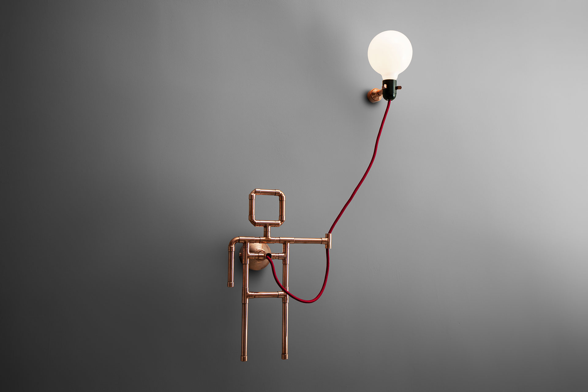 Pipe guy with balloon trendy sconce inspired by industrial design