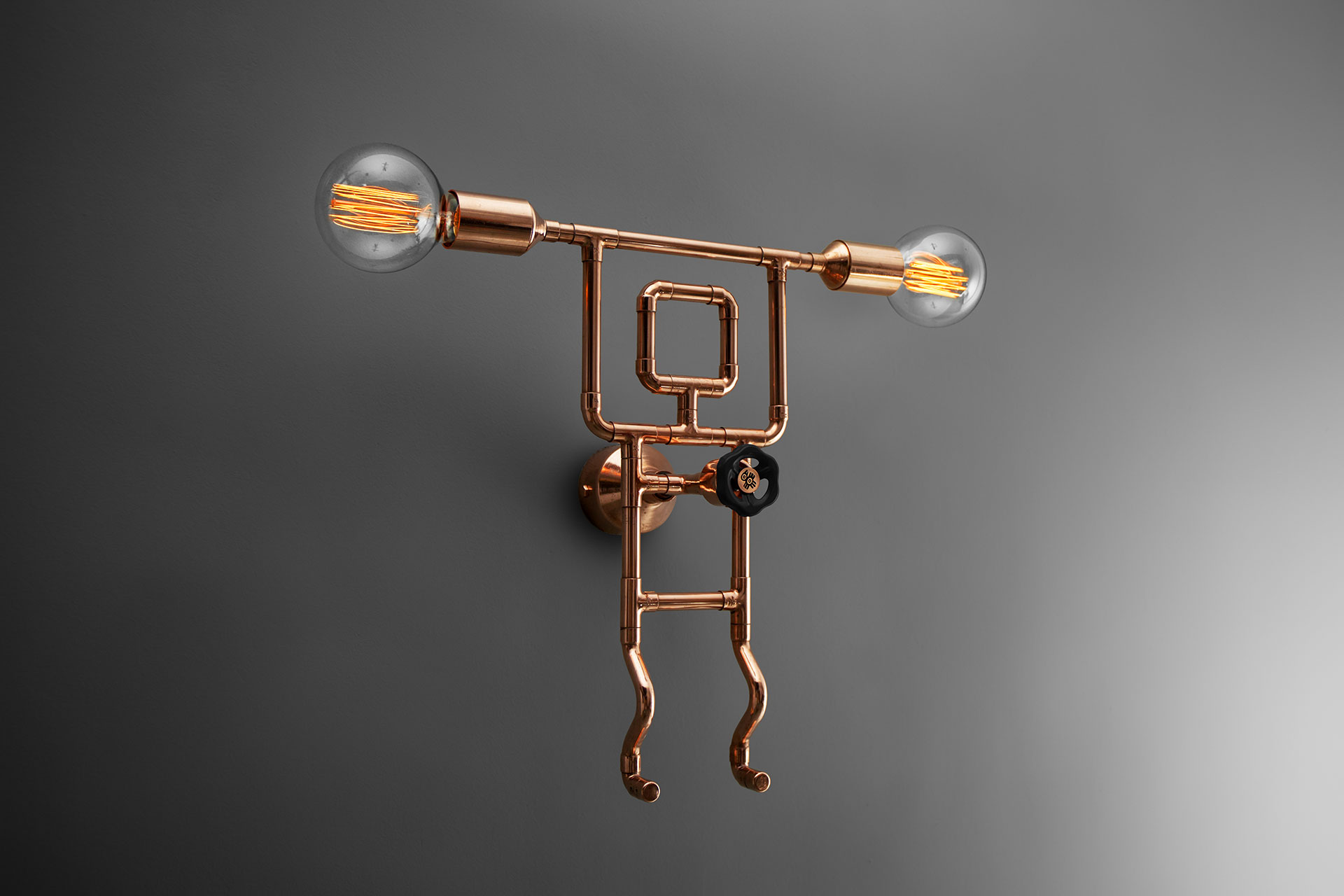 Cool dimmable sconce in copper or brass inspired by industrial design