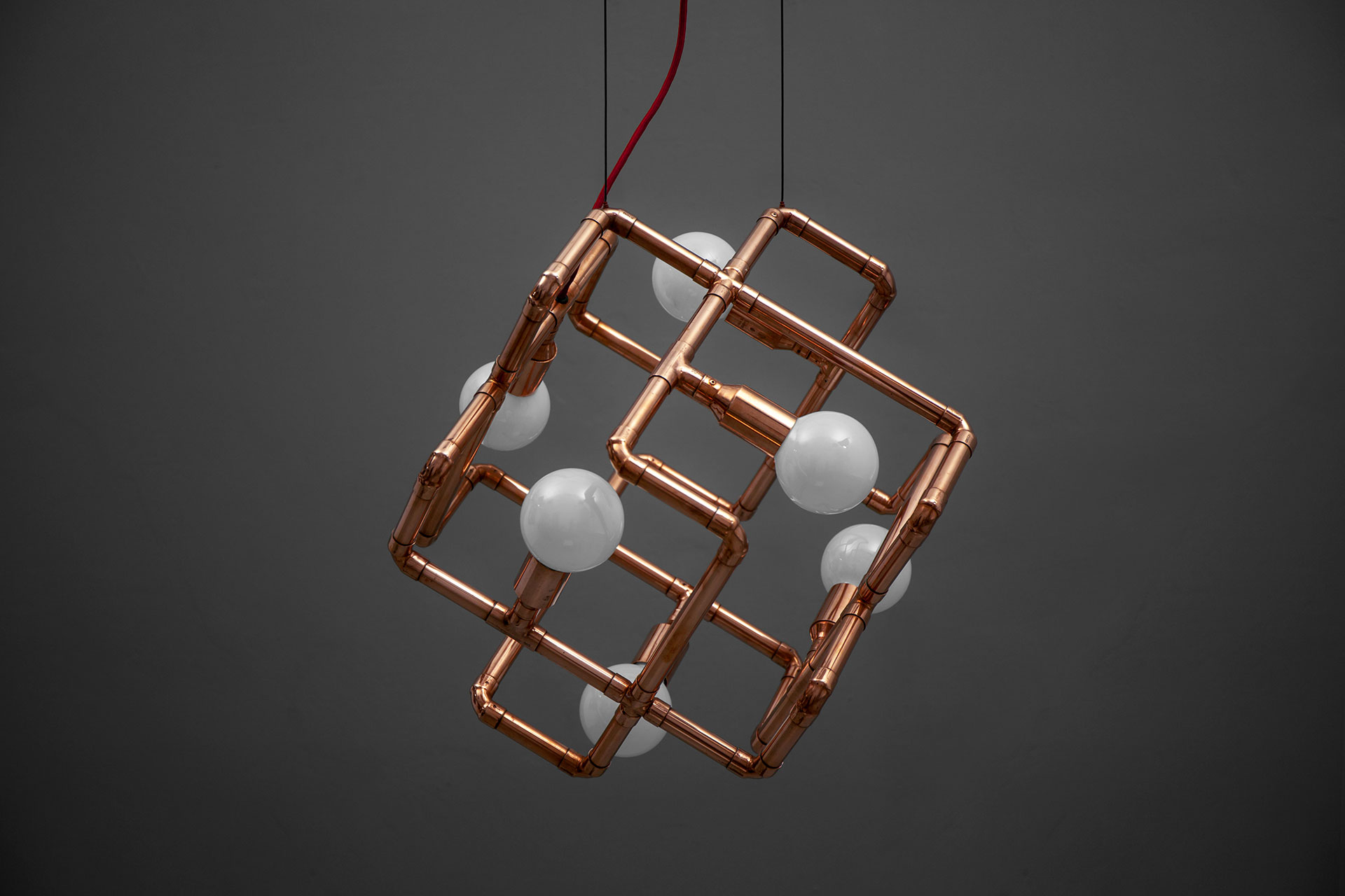 Large 6-lights chandelier in trendy copper or brass in loft style interior