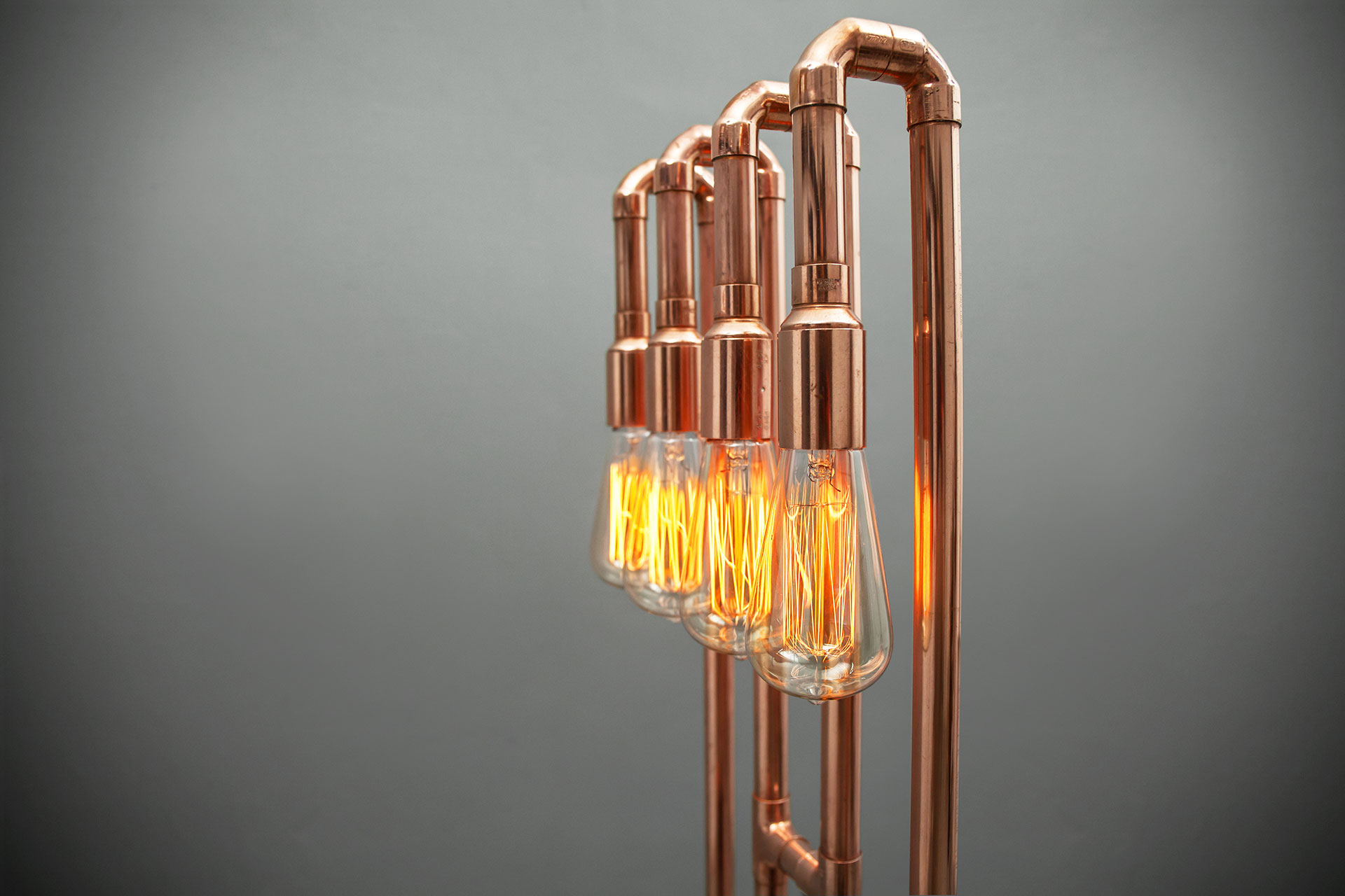 Vintage Edison bulbs in copper floor lamp inspired by loft style