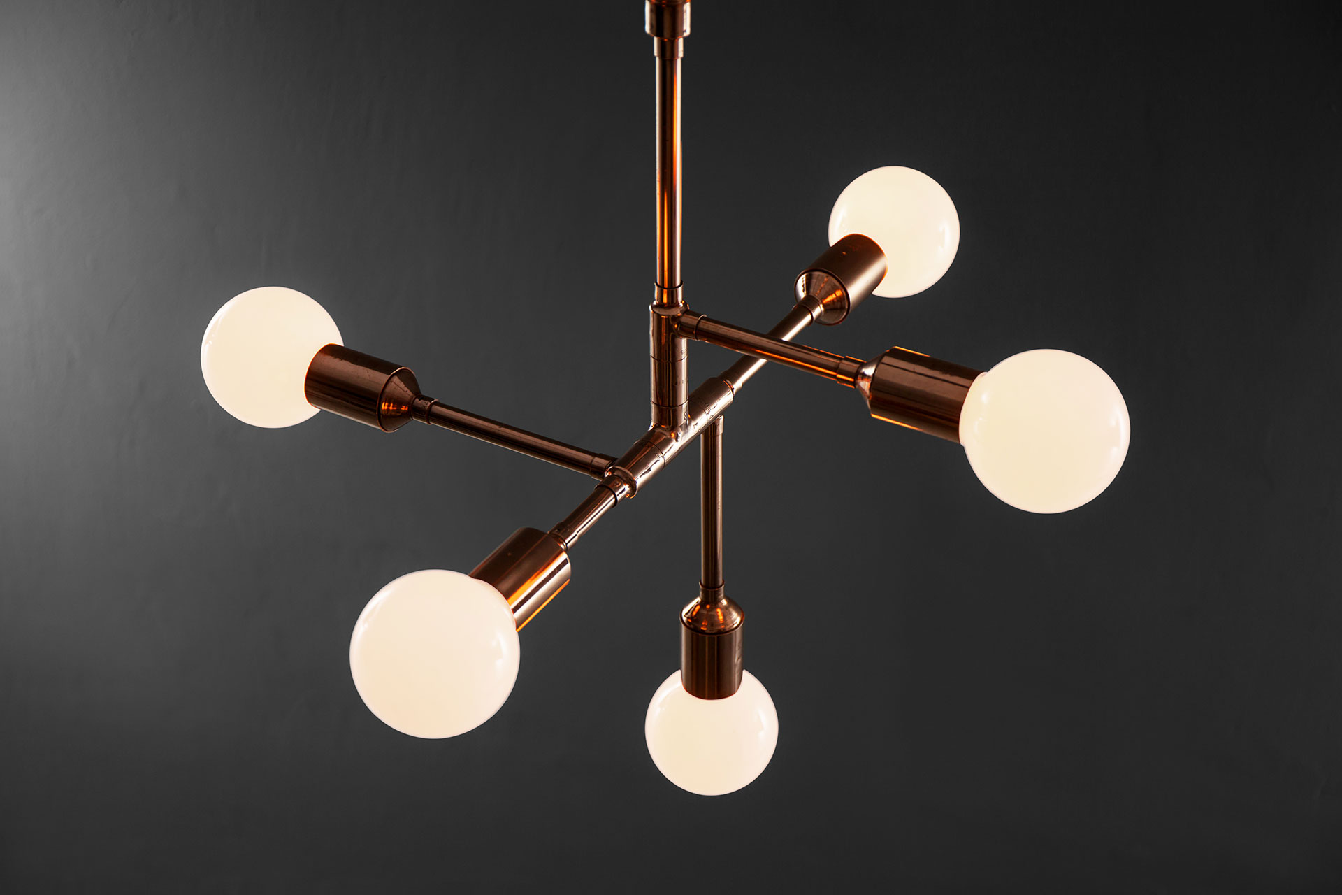 Industrial design ceiling lamp in modern men's apartment