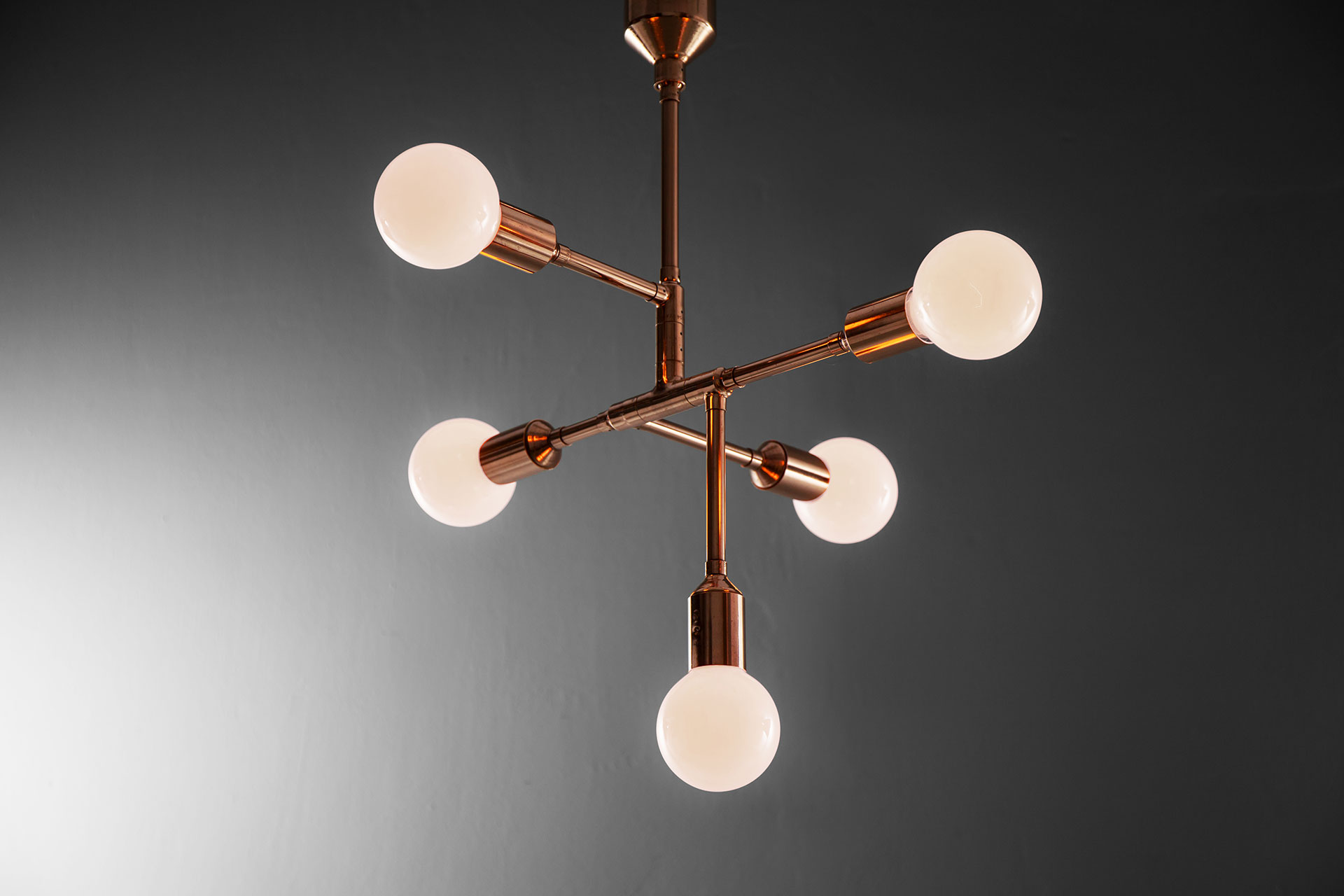 Designer lighting chandelier in copper or gold color