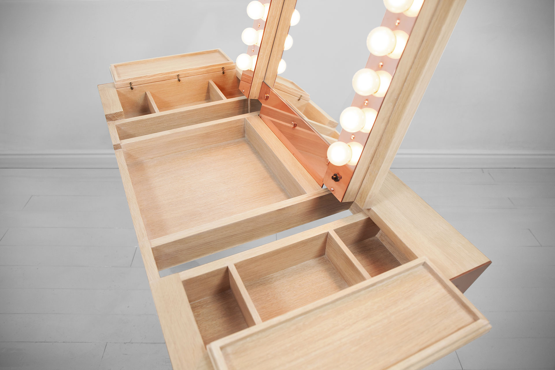 Wooden vanity with makeup lights and folding mirror