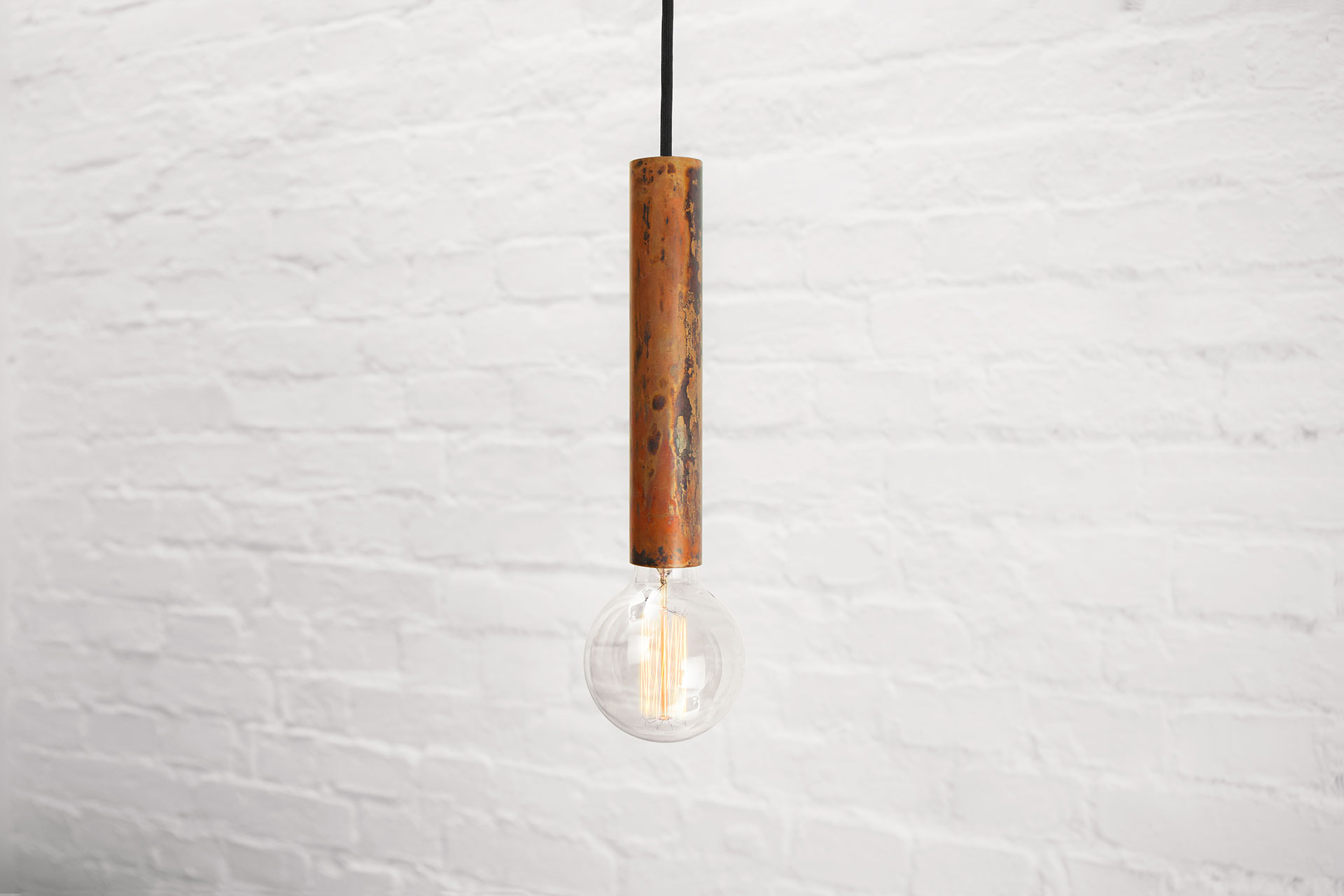Rust copper pendant light with vintage Edison bulb