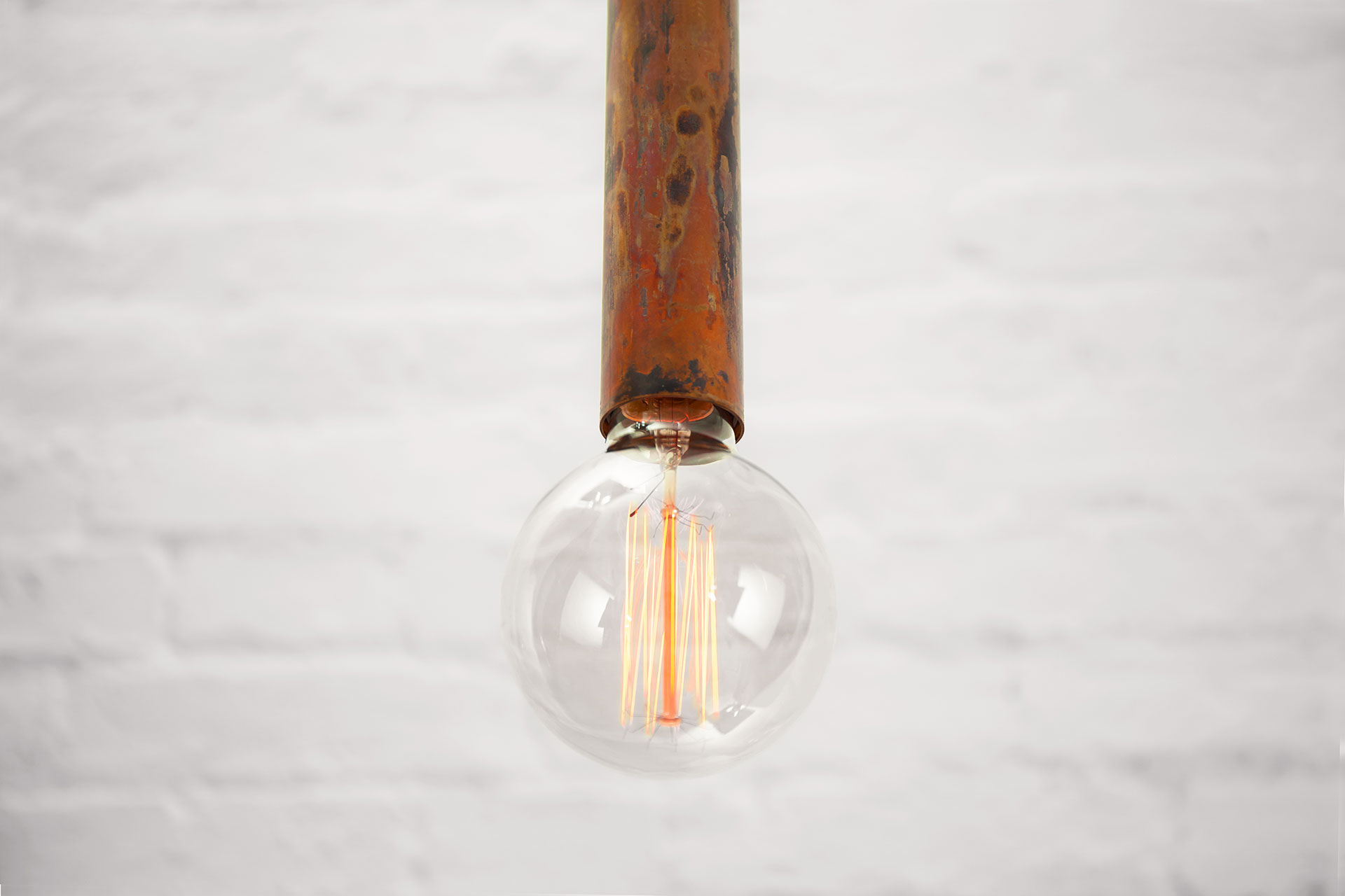 Designer pendant lamp in rust copper metal finish
