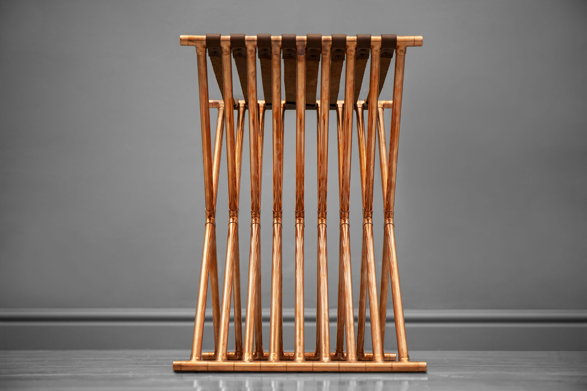 Brutalist design ottoman stool in copper