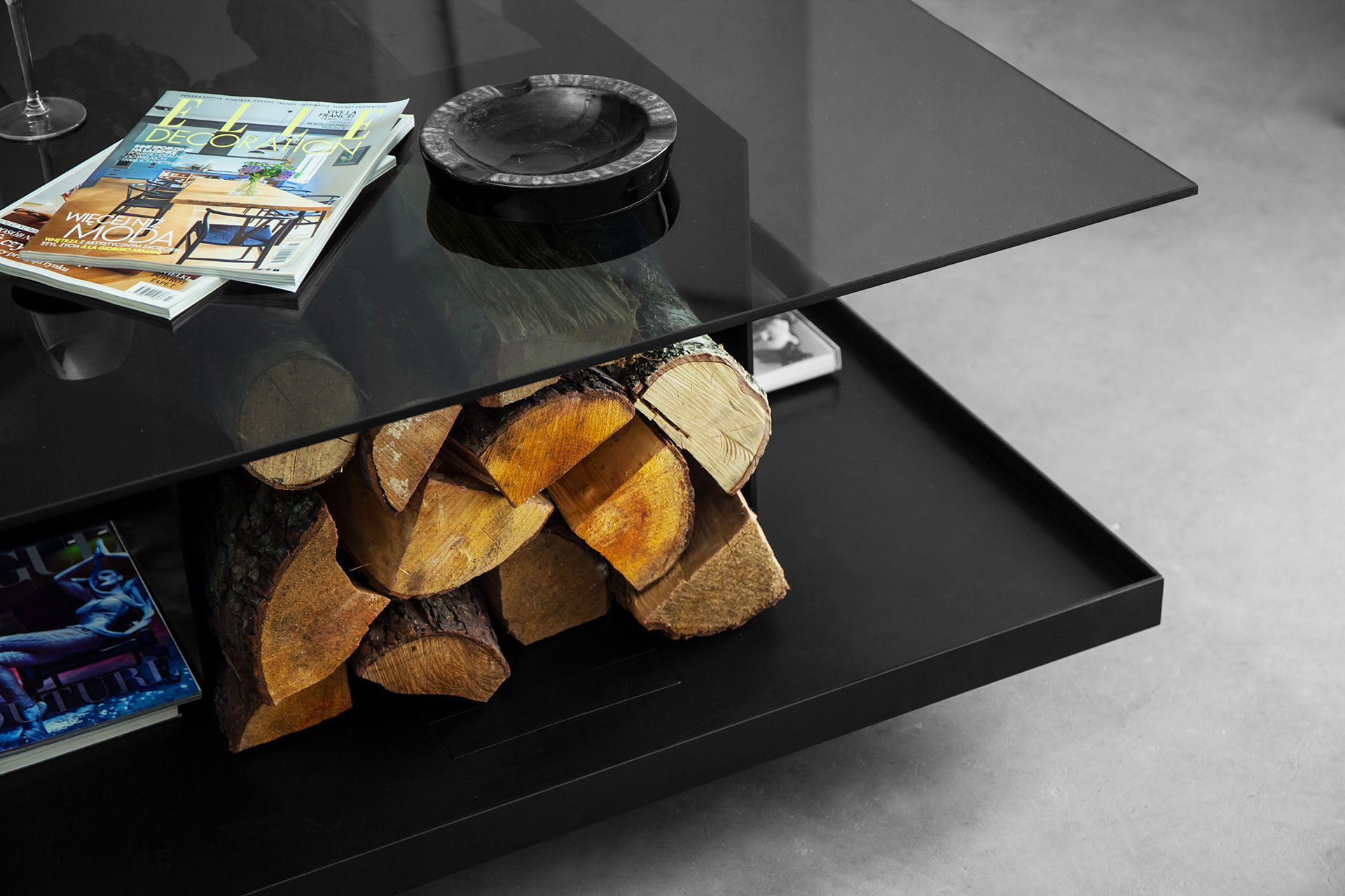 Log storage coffee table inspired by minimalist architecture