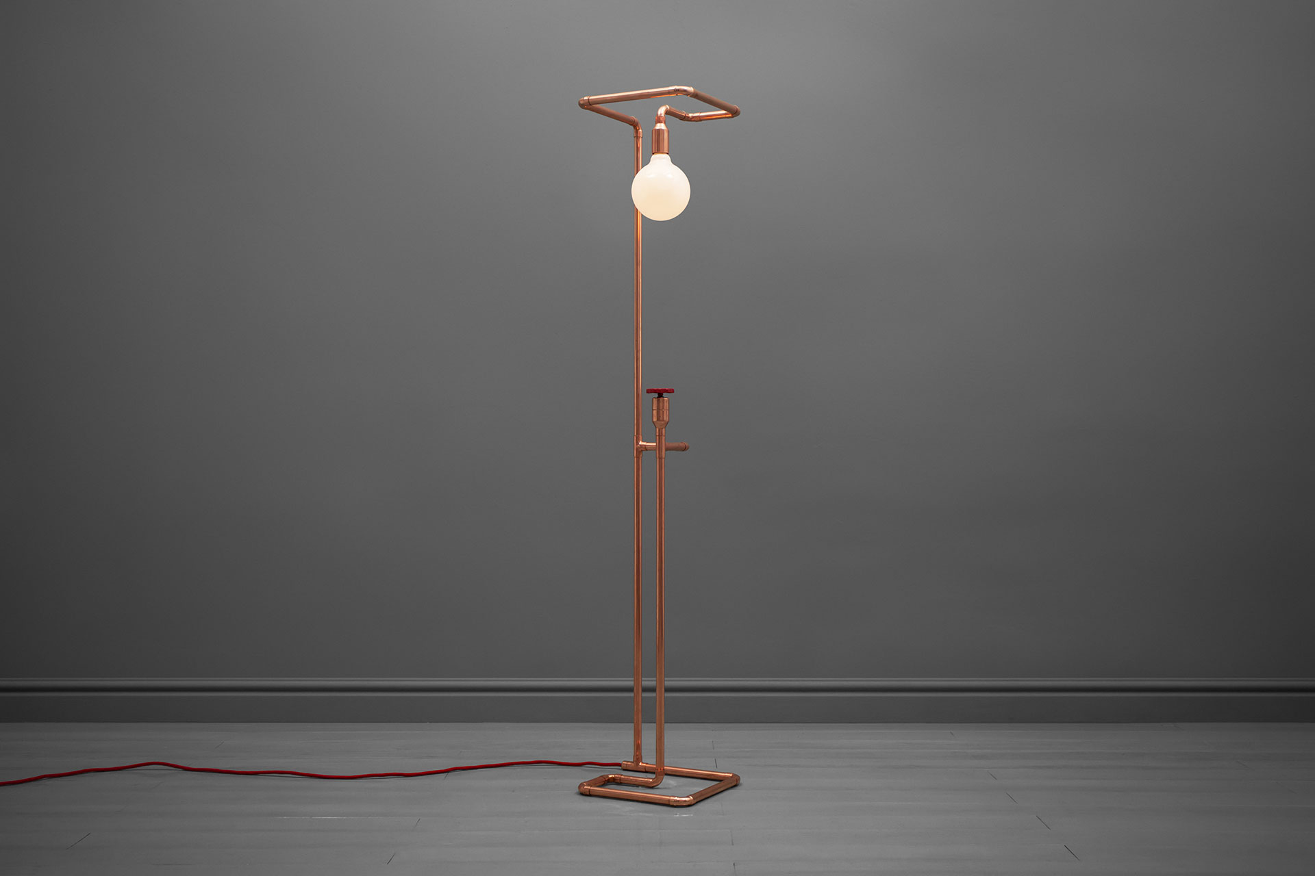 Industrial design copper tubing floor lamp inspired by installation art