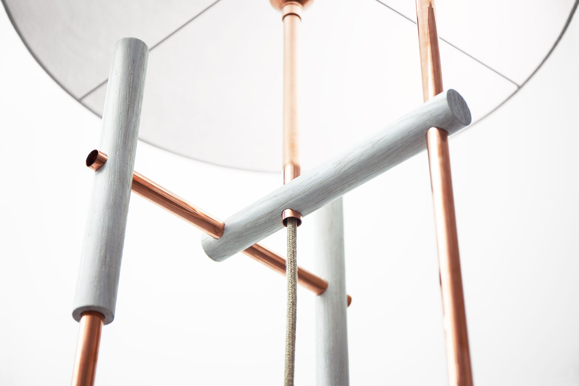 Minimalist design floor lamp in trendy copper and white wood inspired by the art of the Japanese joinery