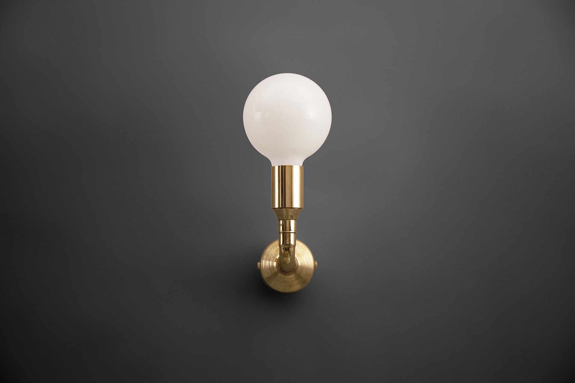 Simple brass sconce inspired by loft design