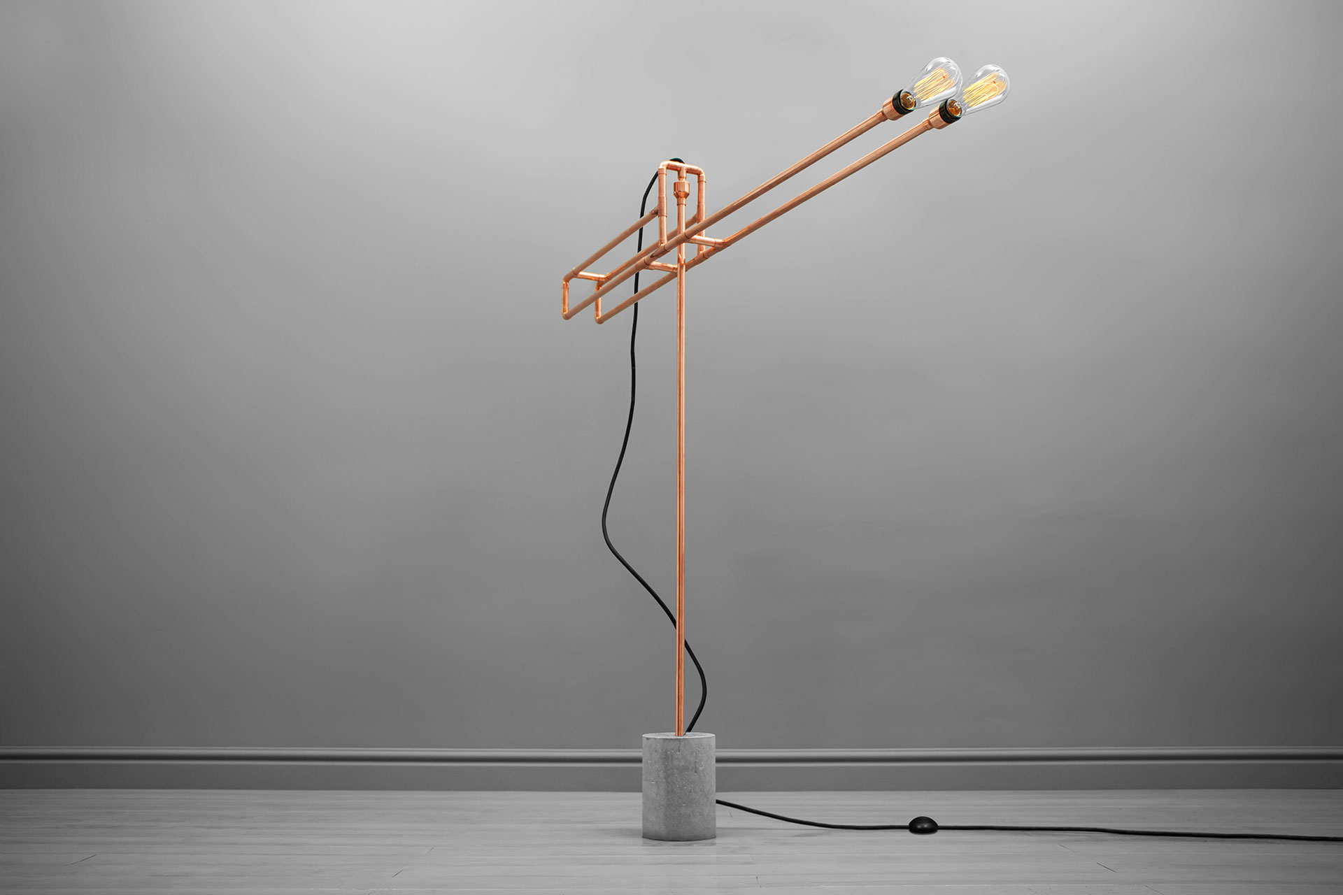 Industrial design floor lamp in copper or brass inspired by Frank Buchwald machine lights