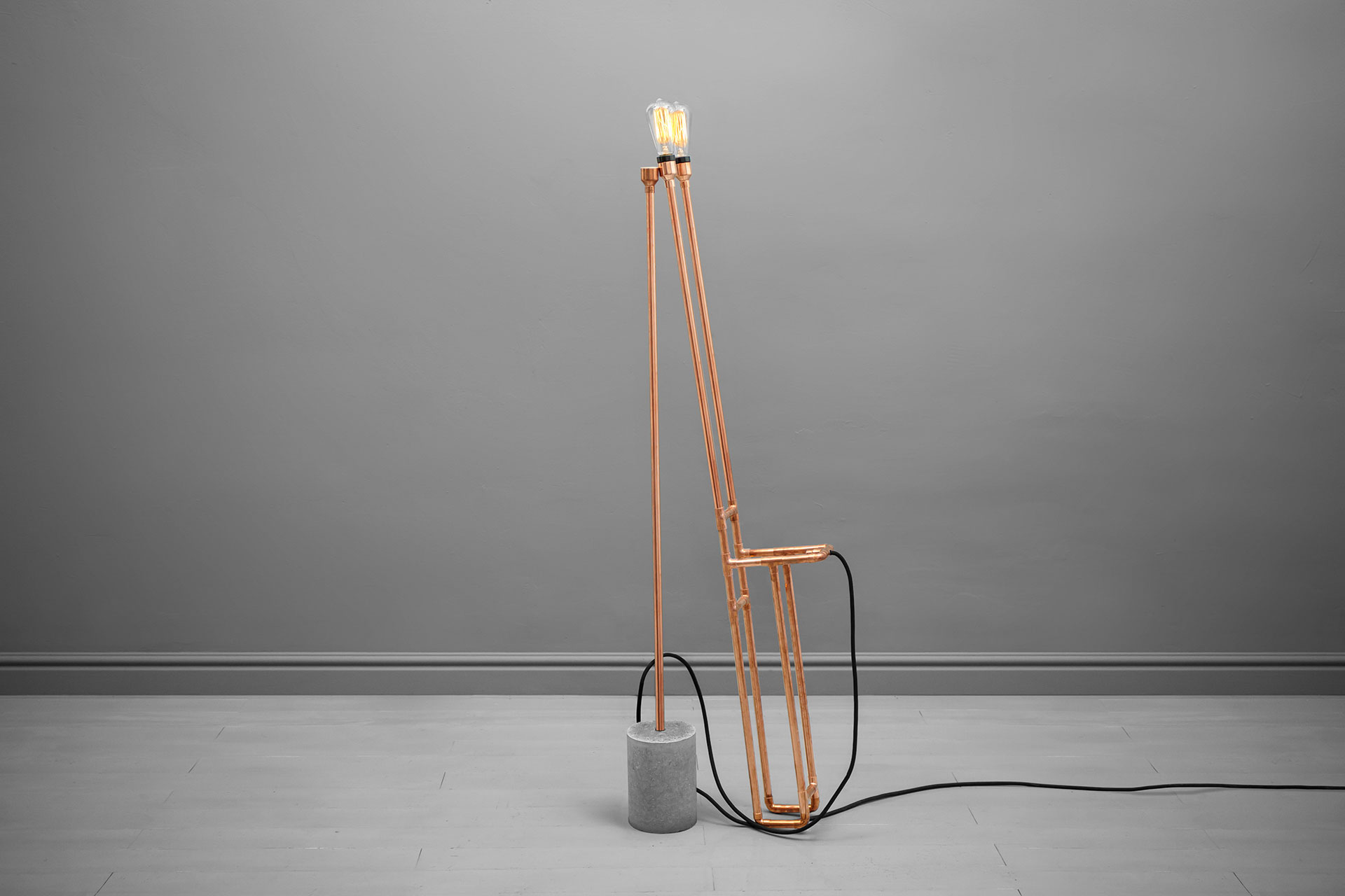 Two separate pieces of the copper floor lamp inspired by steampunk design